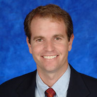 David E. Buck, R, Broker-in-Charge of Oahu Sales